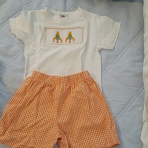 Hand smocked rocket outfit.